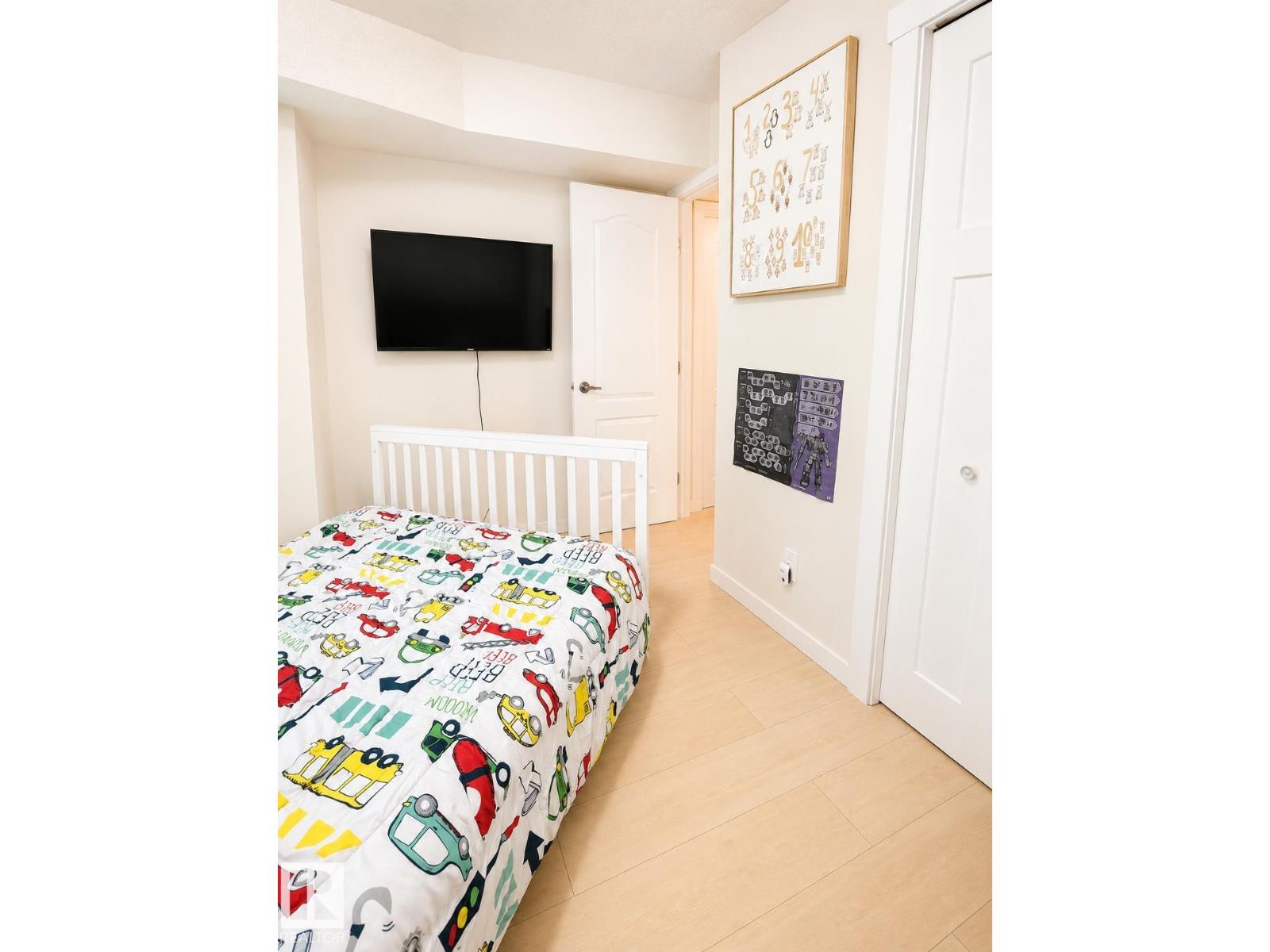 #101 11825 71 ST NW - 18