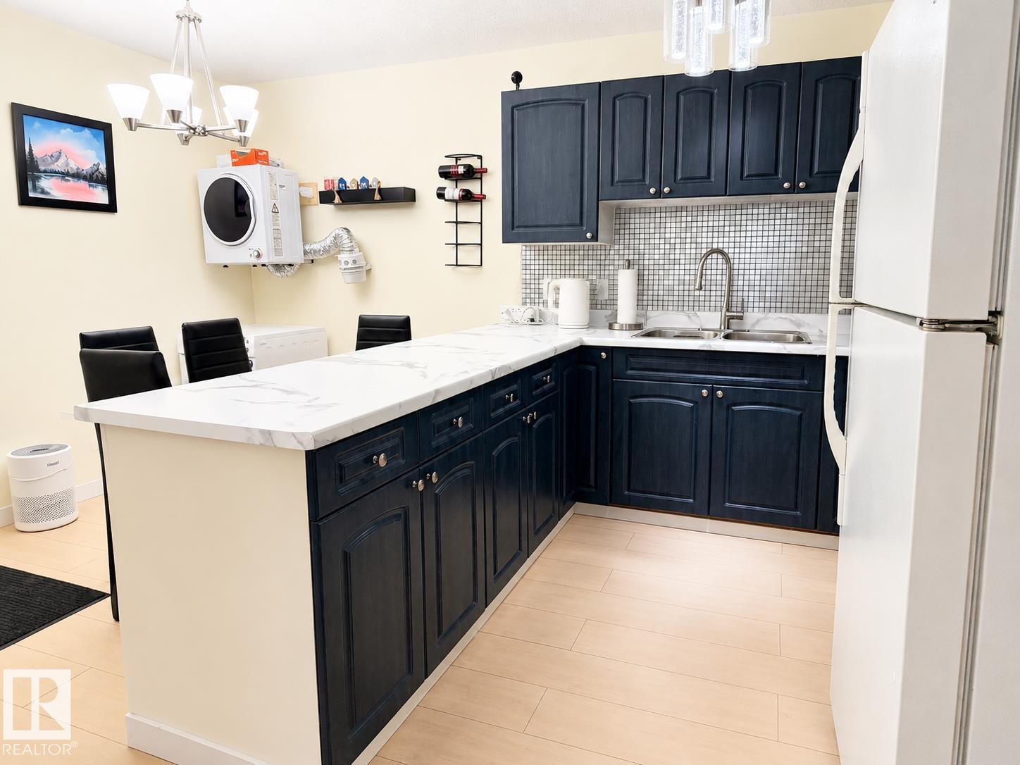 #101 11825 71 ST NW - 7