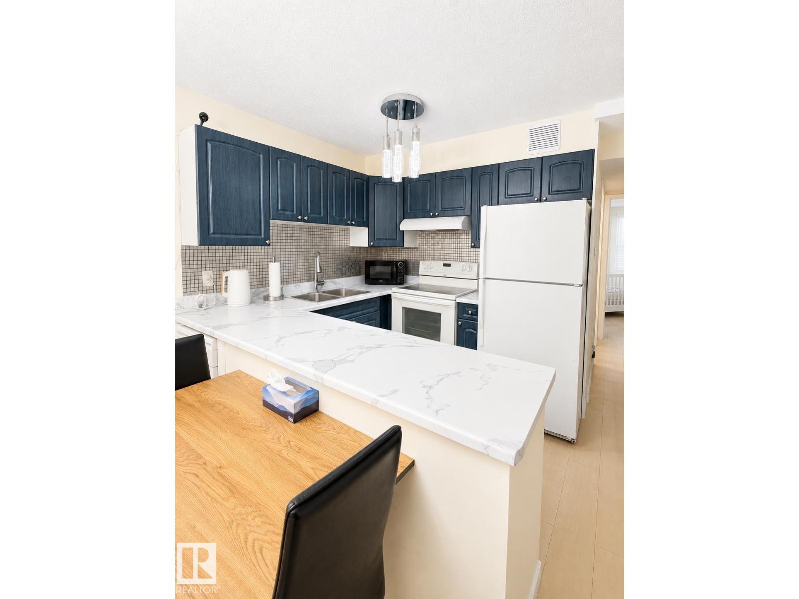 #101 11825 71 ST NW - 8