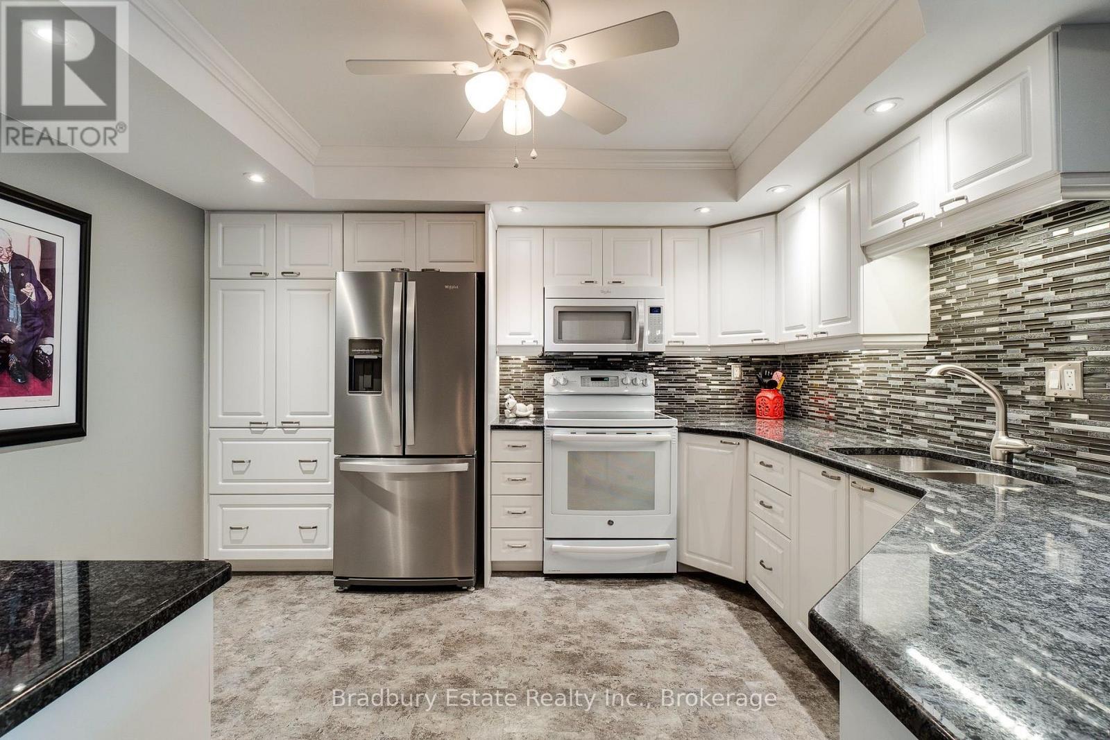 #203 5080 PINEDALE AVENUE N - 4