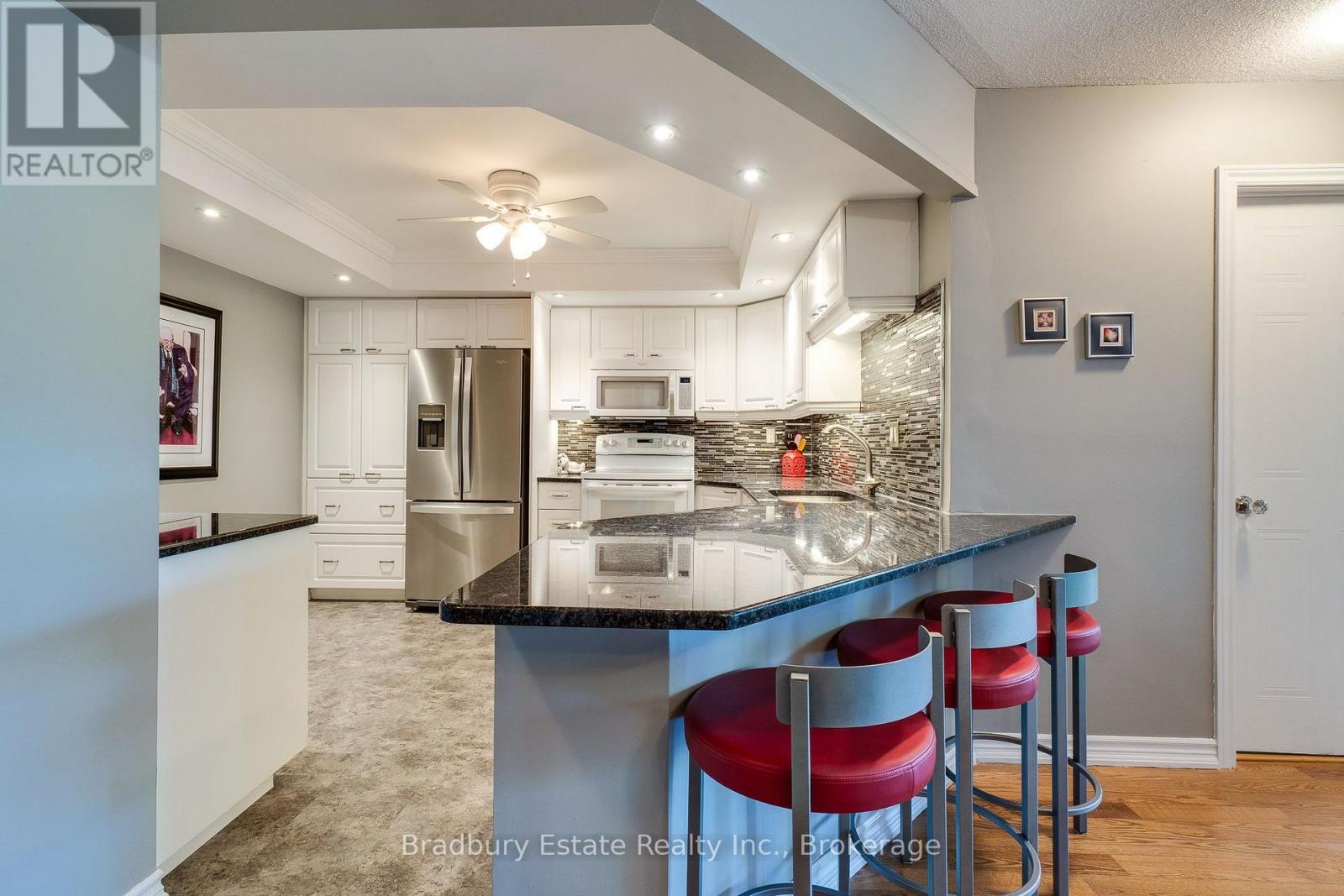 #203 5080 PINEDALE AVENUE N - 6
