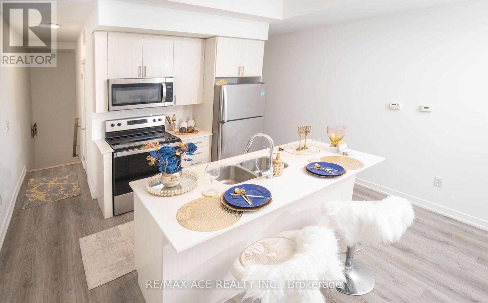 #105 3686 ST CLAIR AVENUE E - 4