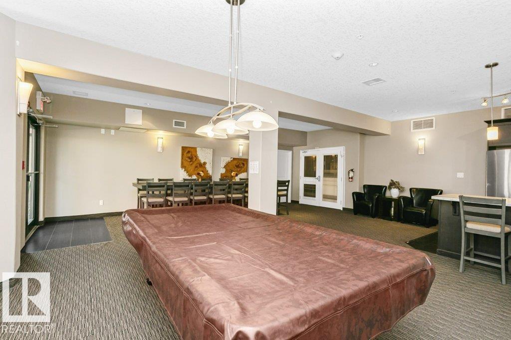 #256 6079 MAYNARD WY NW - 40