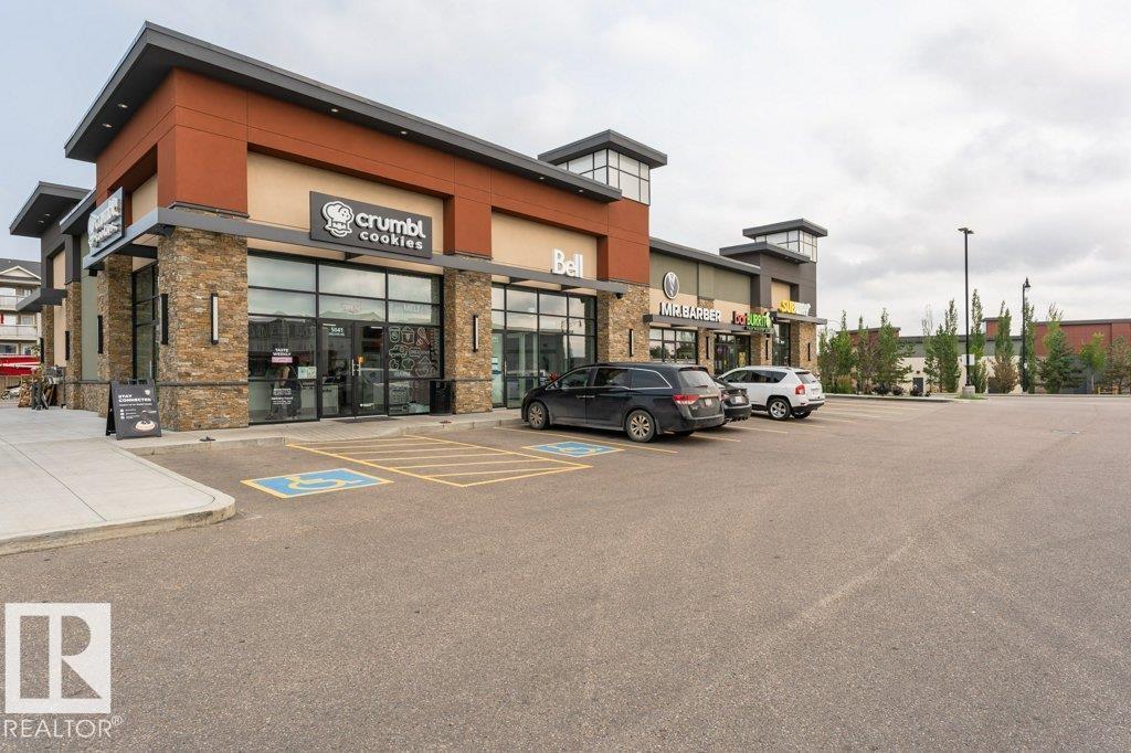 #256 6079 MAYNARD WY NW - 53