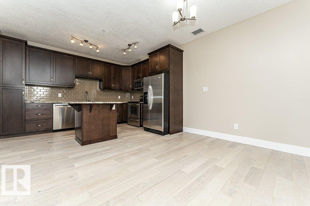 #256 6079 MAYNARD WY NW - 6