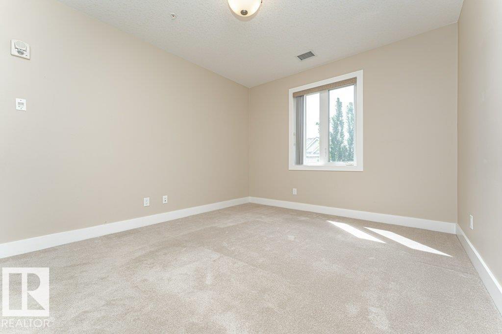 #256 6079 MAYNARD WY NW - 24