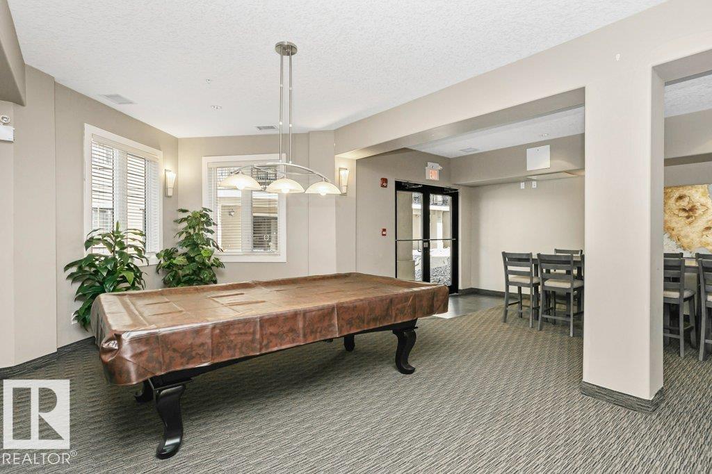#256 6079 MAYNARD WY NW - 42