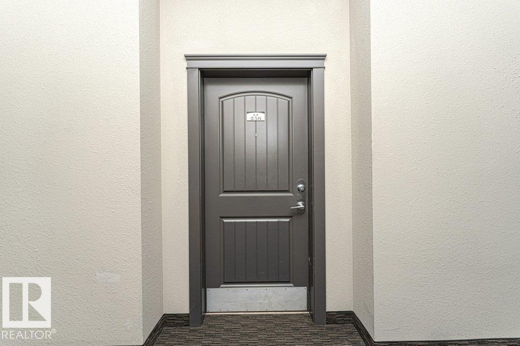 #256 6079 MAYNARD WY NW - 2