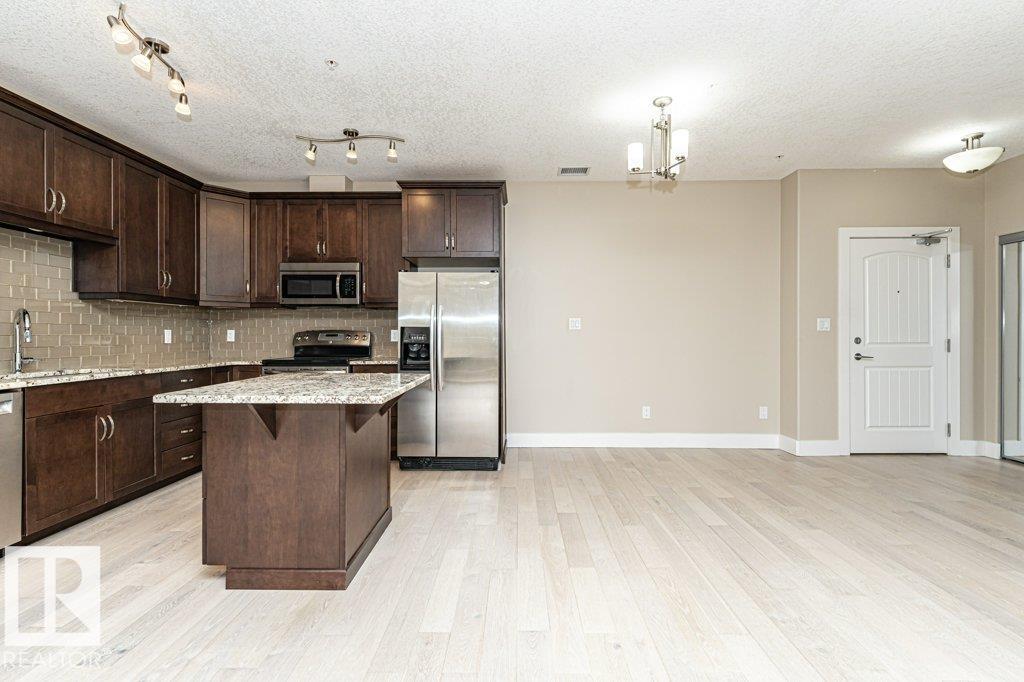 #256 6079 MAYNARD WY NW - 5