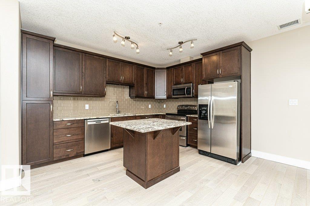 #256 6079 MAYNARD WY NW - 9