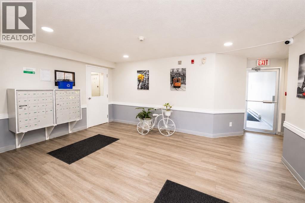 #303 5555 Falsbridge Drive NE - 19