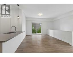 Bedroom - 801, 24 Rivercrest Drive, Cochrane, AB T4C2C8 Photo 6