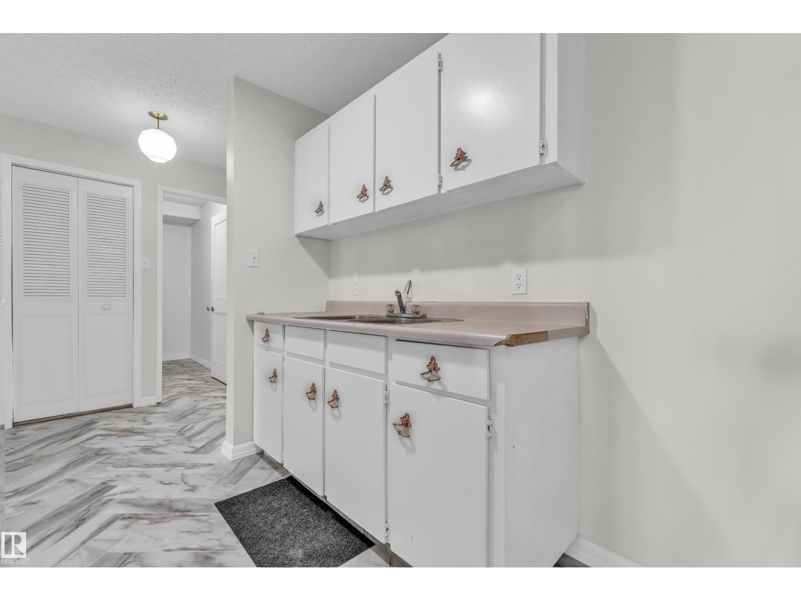 #105 10725 111ST NW - 11