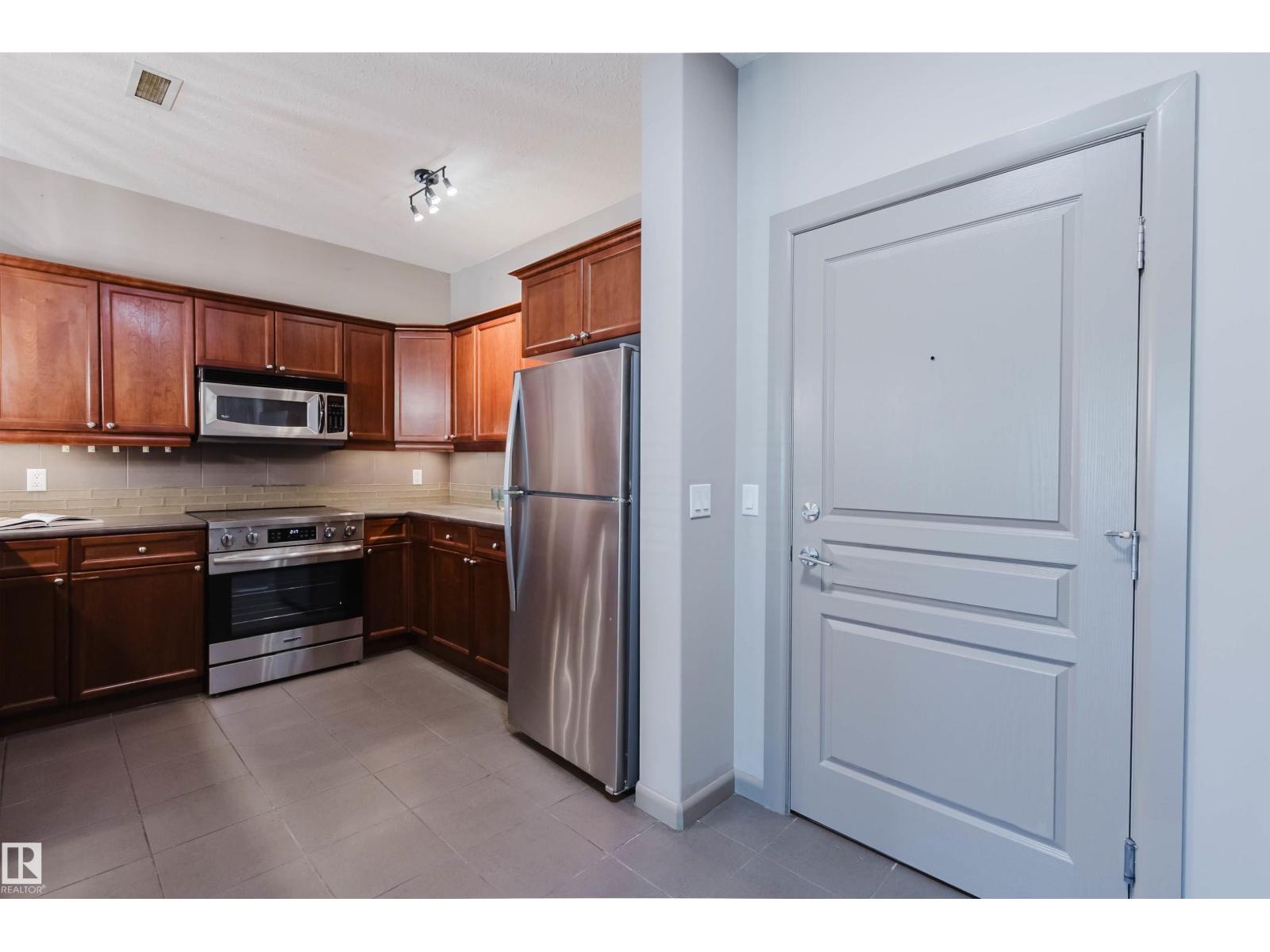#106 160 MAGRATH RD NW - 14