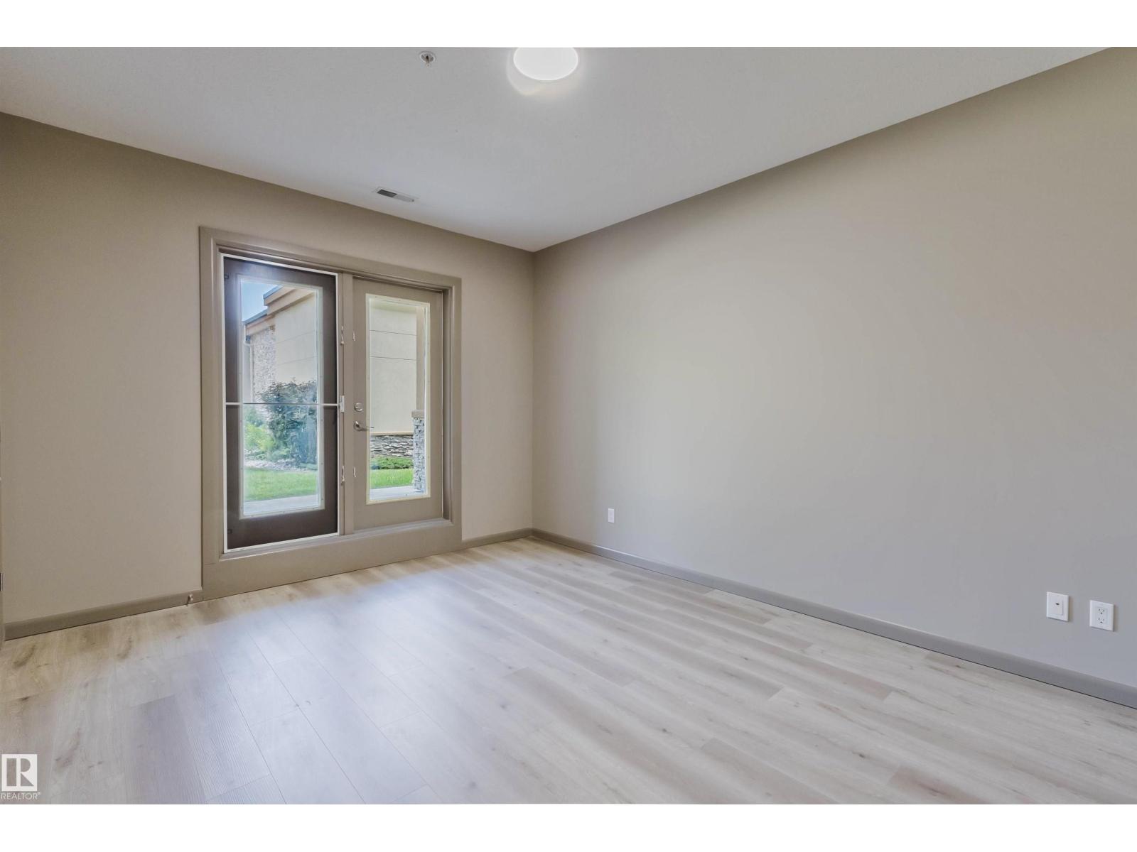 #106 160 MAGRATH RD NW - 31