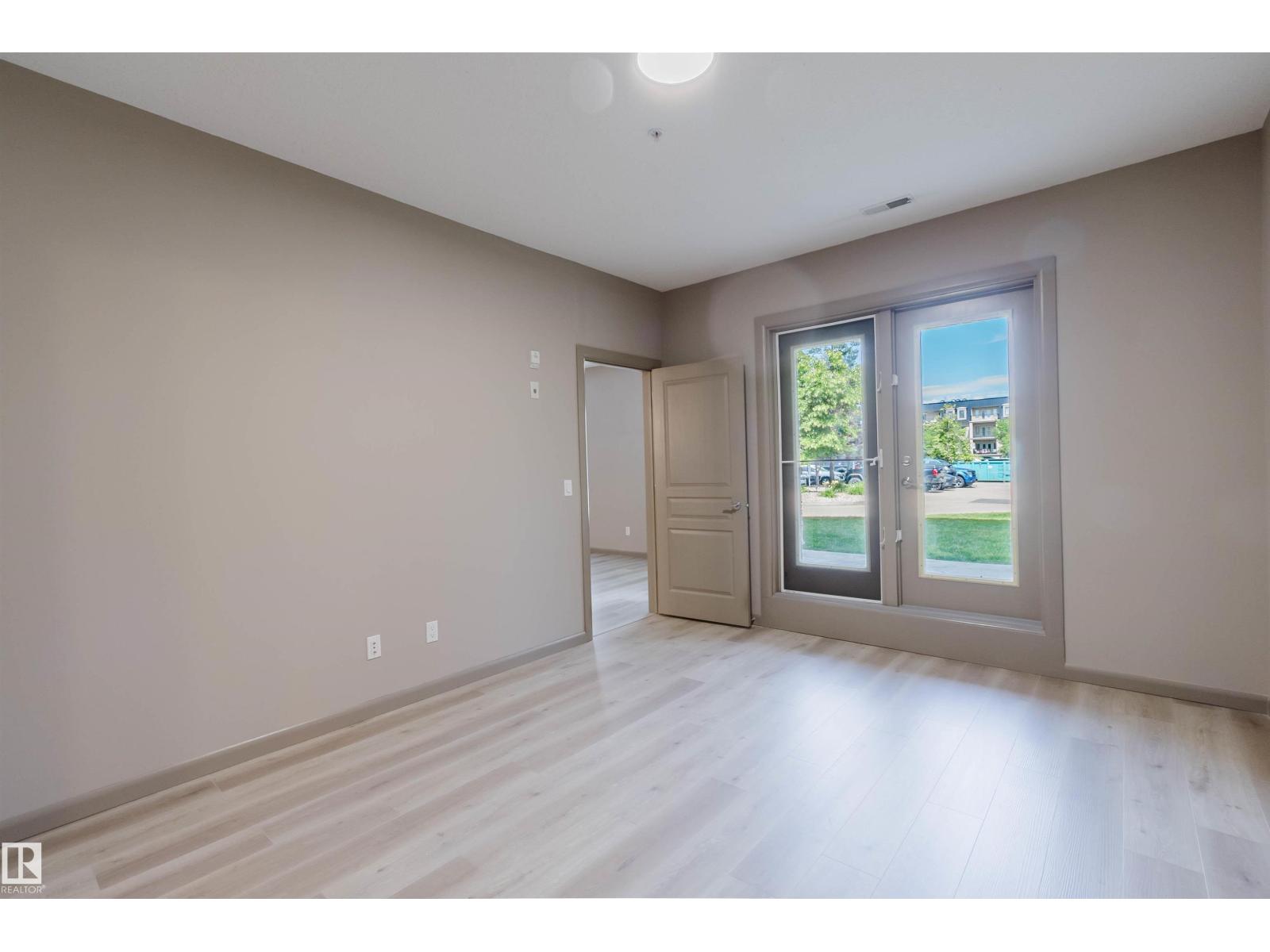 #106 160 MAGRATH RD NW - 32