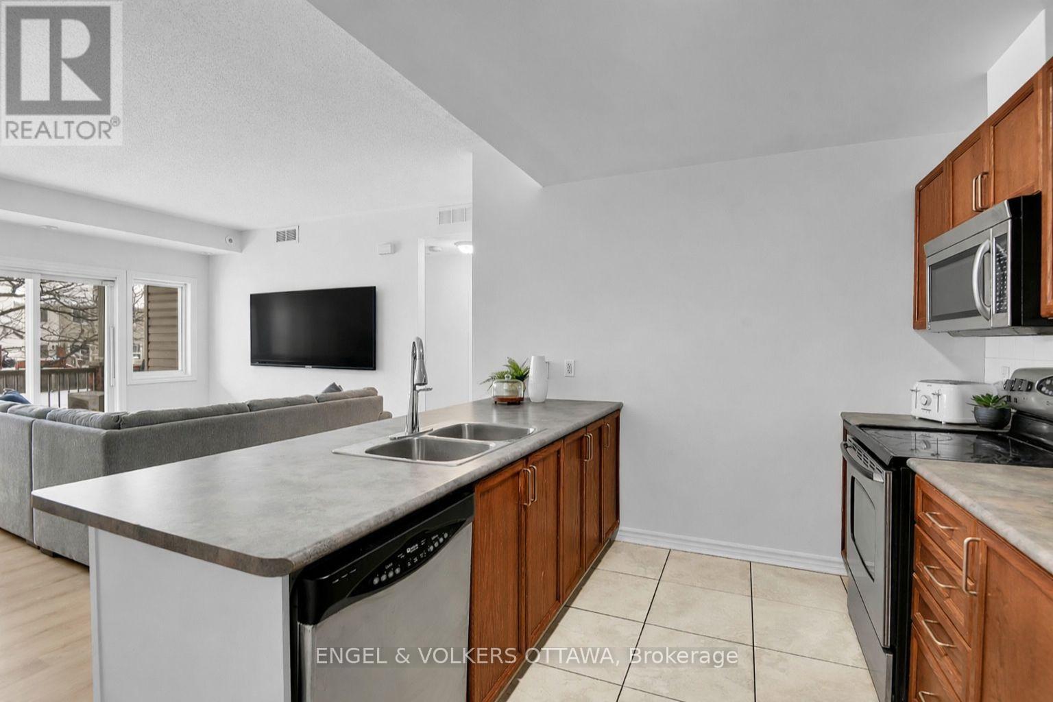 #5 165 WATERBRIDGE DRIVE - Image 9