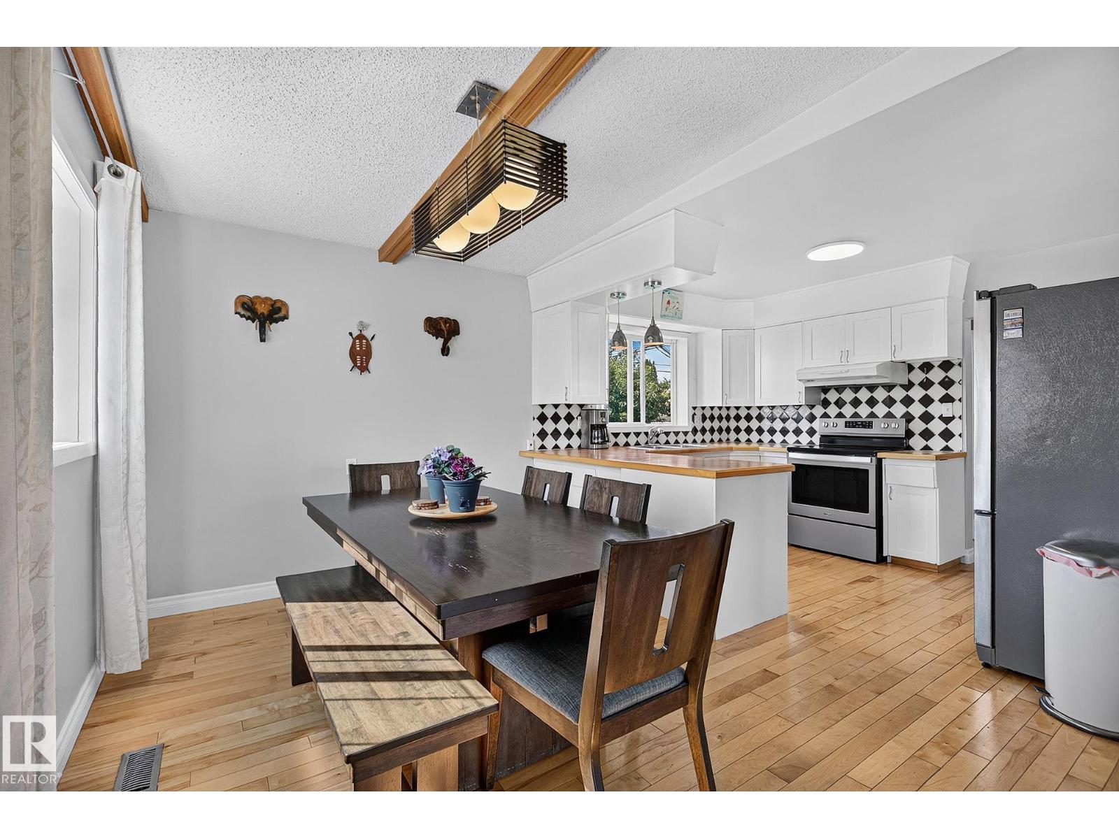 7703 134 AV NW - 5