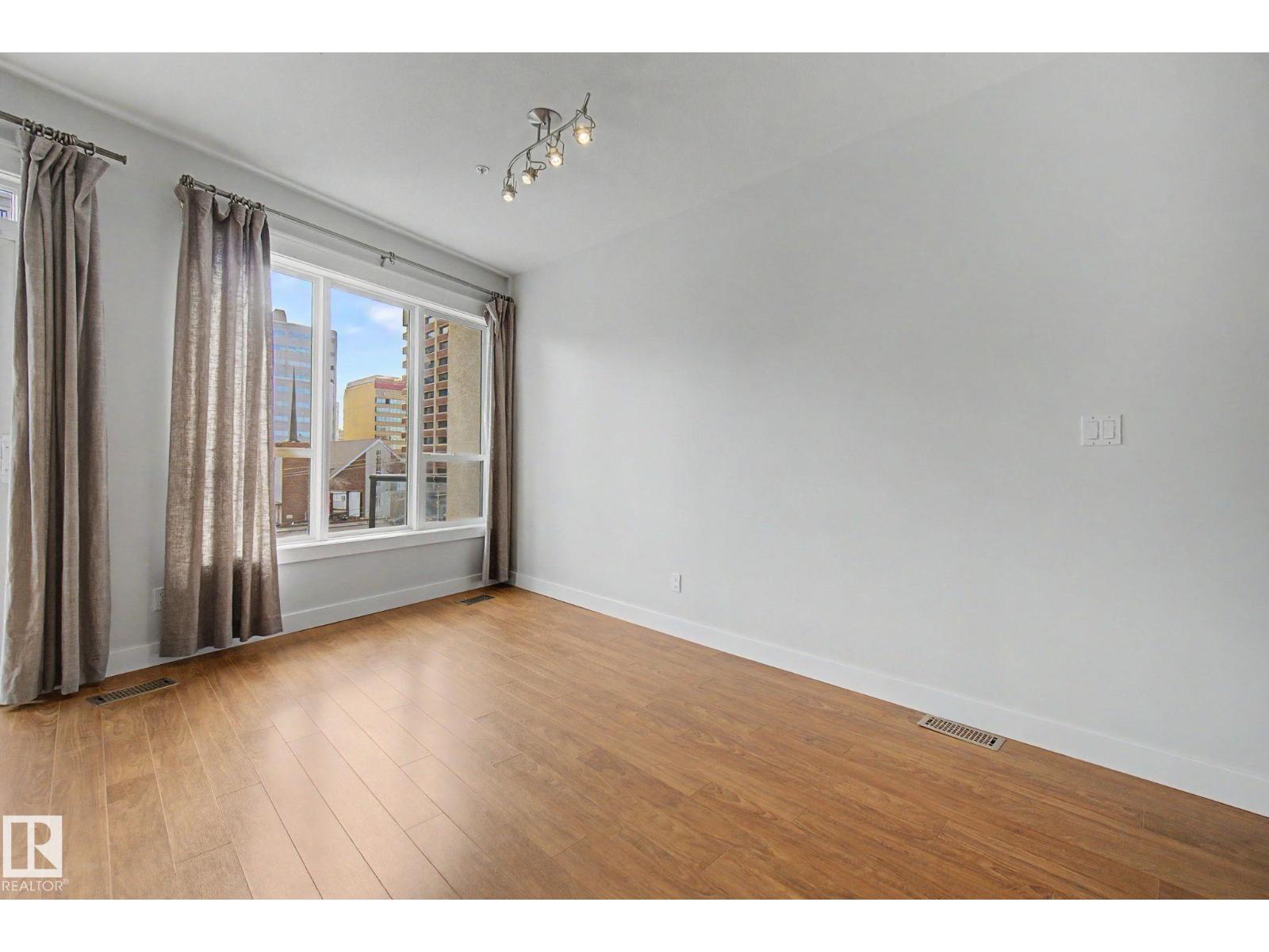#411 10033 110 ST NW - 15