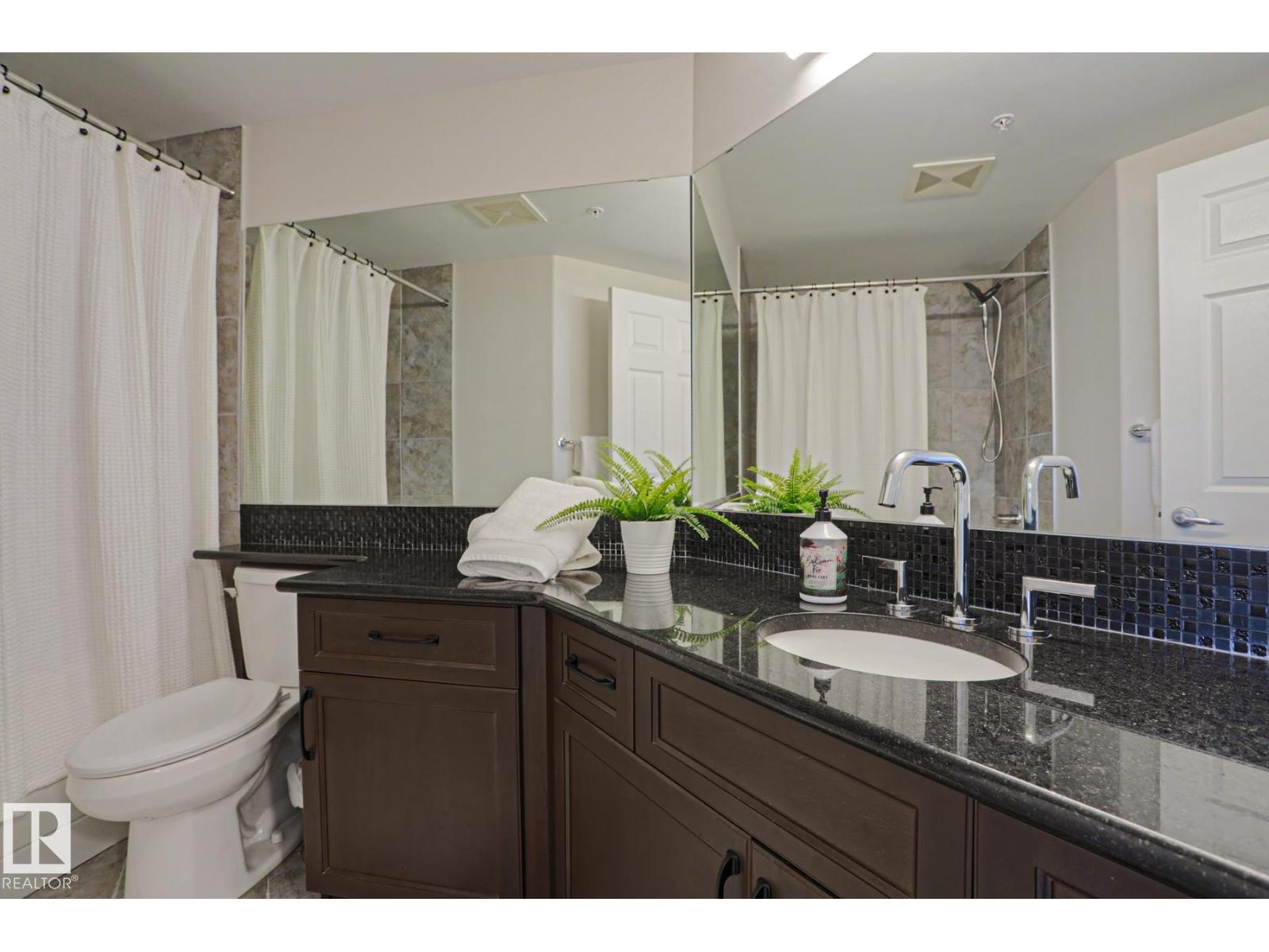 #703 10303 111 ST NW - 28