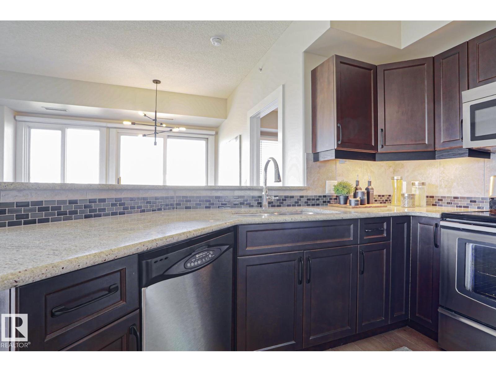 #703 10303 111 ST NW - 33