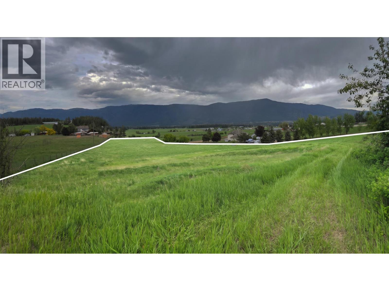 Elevated building site with 180 degree views of the valley.