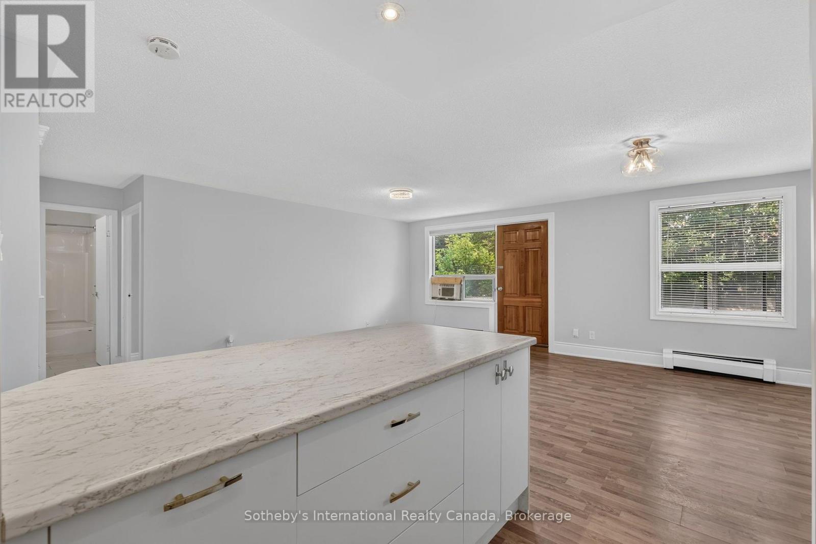 #101 173 EIGHTH STREET - 23