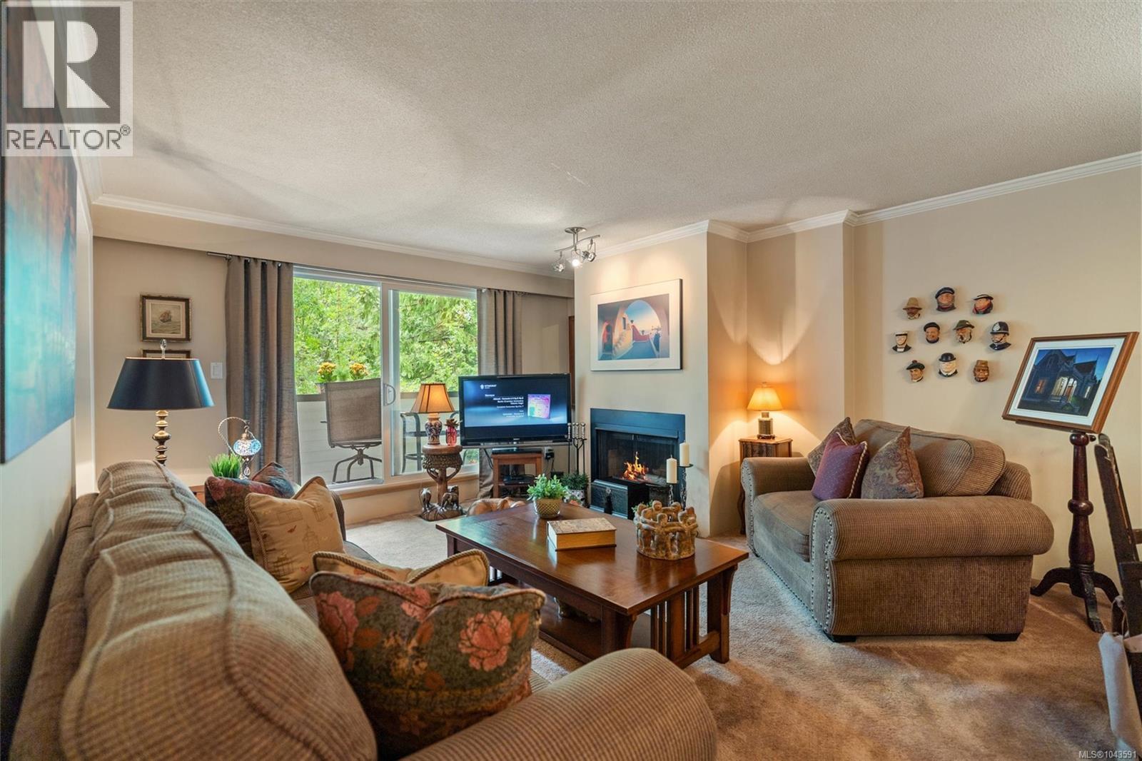 #303 1068 Tolmie Ave - 3