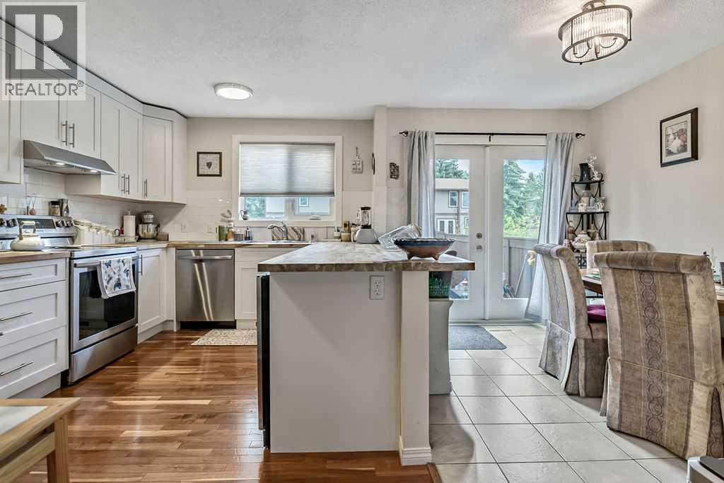 #114 6103 Madigan Drive NE - 6