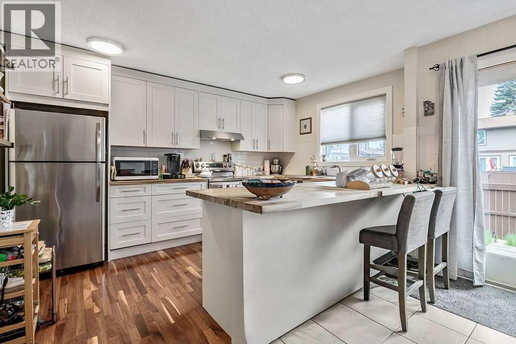 #114 6103 Madigan Drive NE - 7