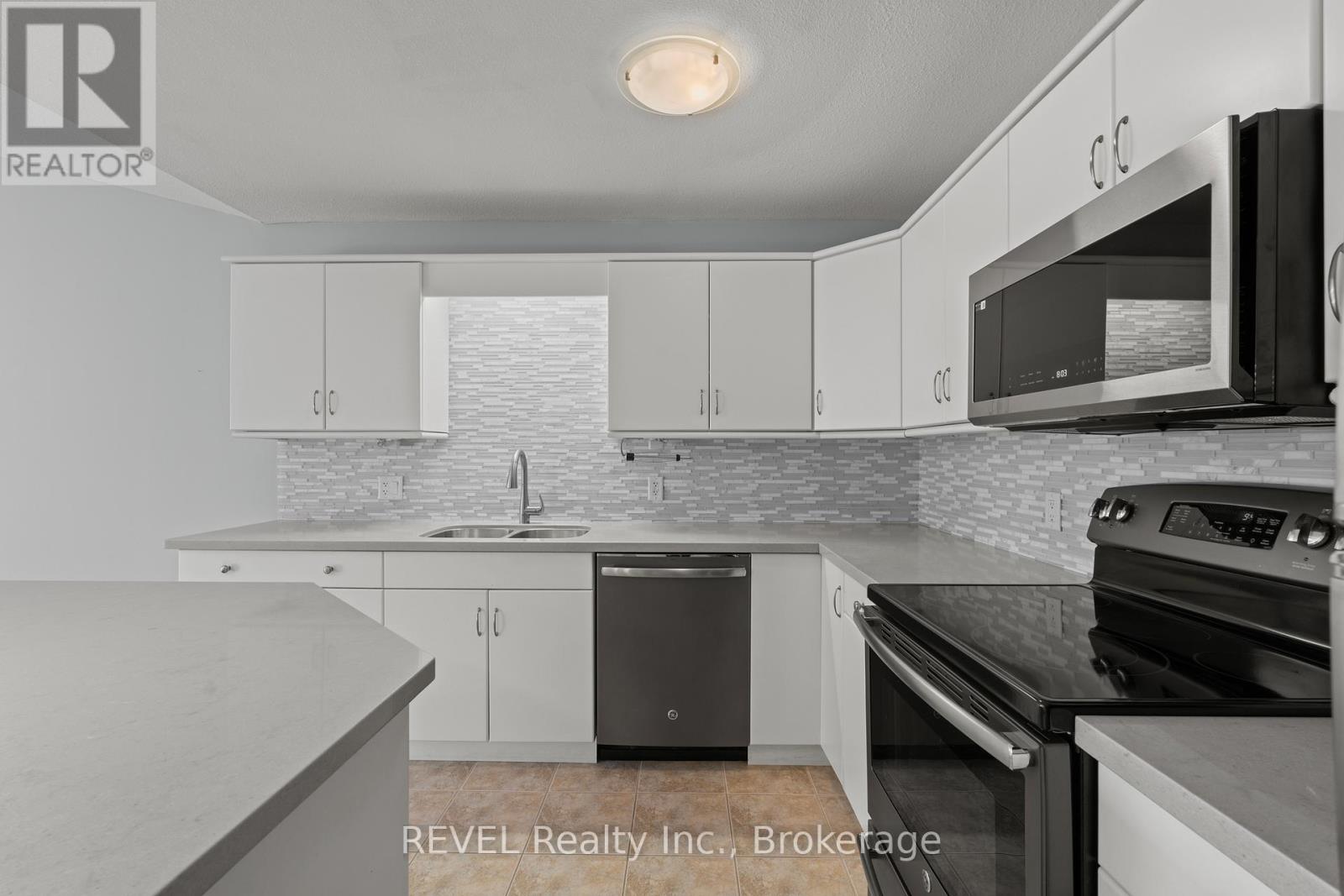 #3 605 WELLAND AVENUE - 7