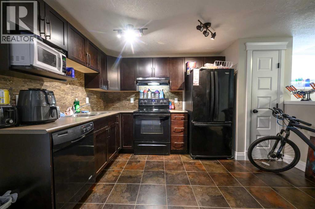 A & B, 9302 100 Avenue - 4