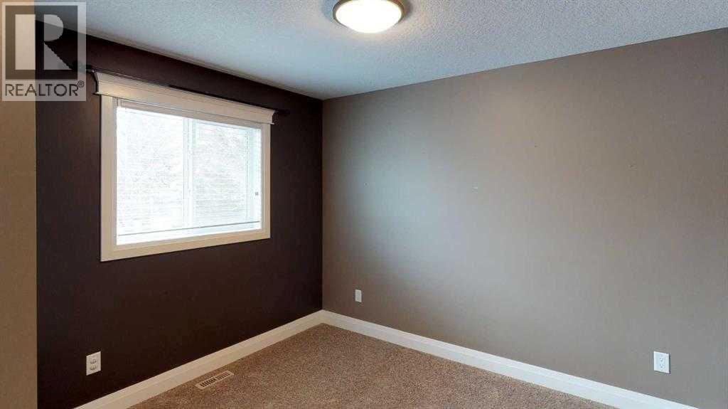 A & B, 9302 100 Avenue - 14