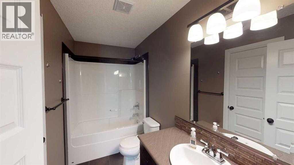 A & B, 9302 100 Avenue - 12