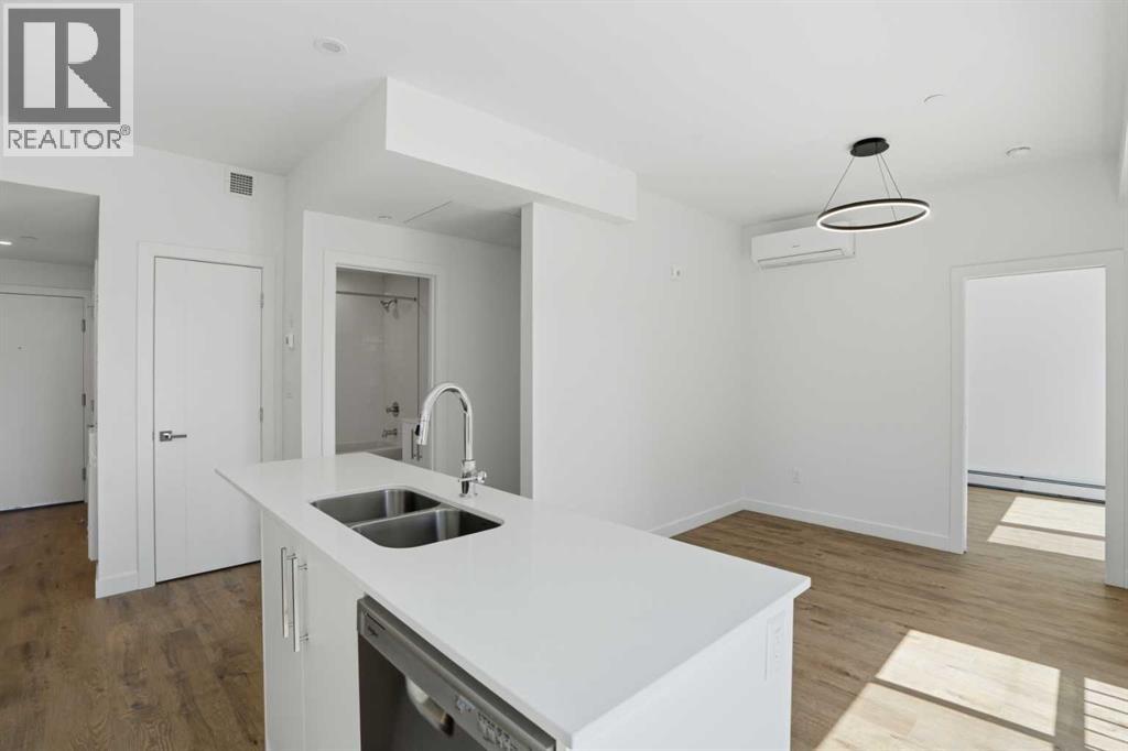 #309 310 15 Avenue SW - 11