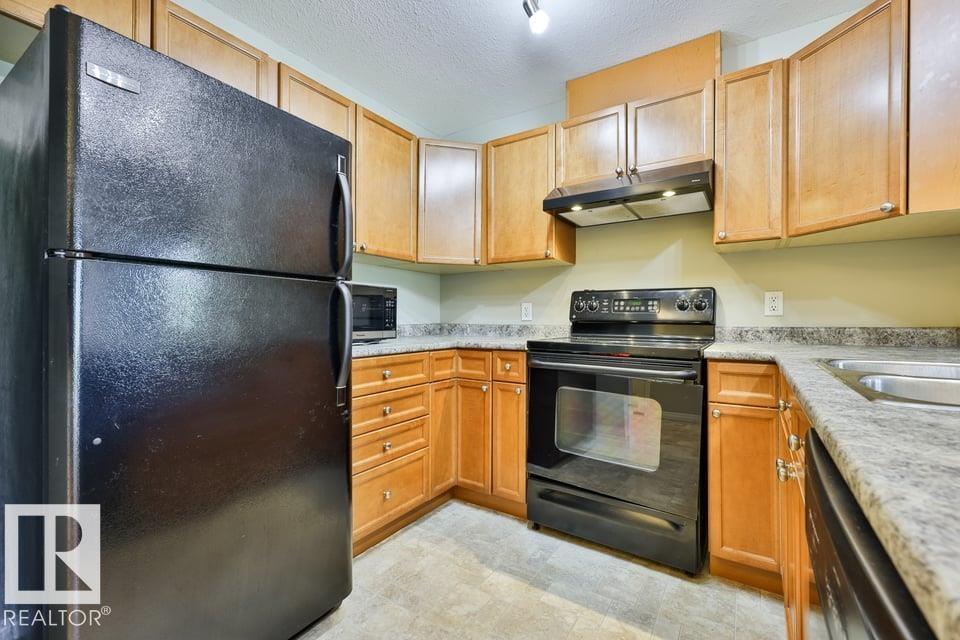 #406 4903 47 AV - 6