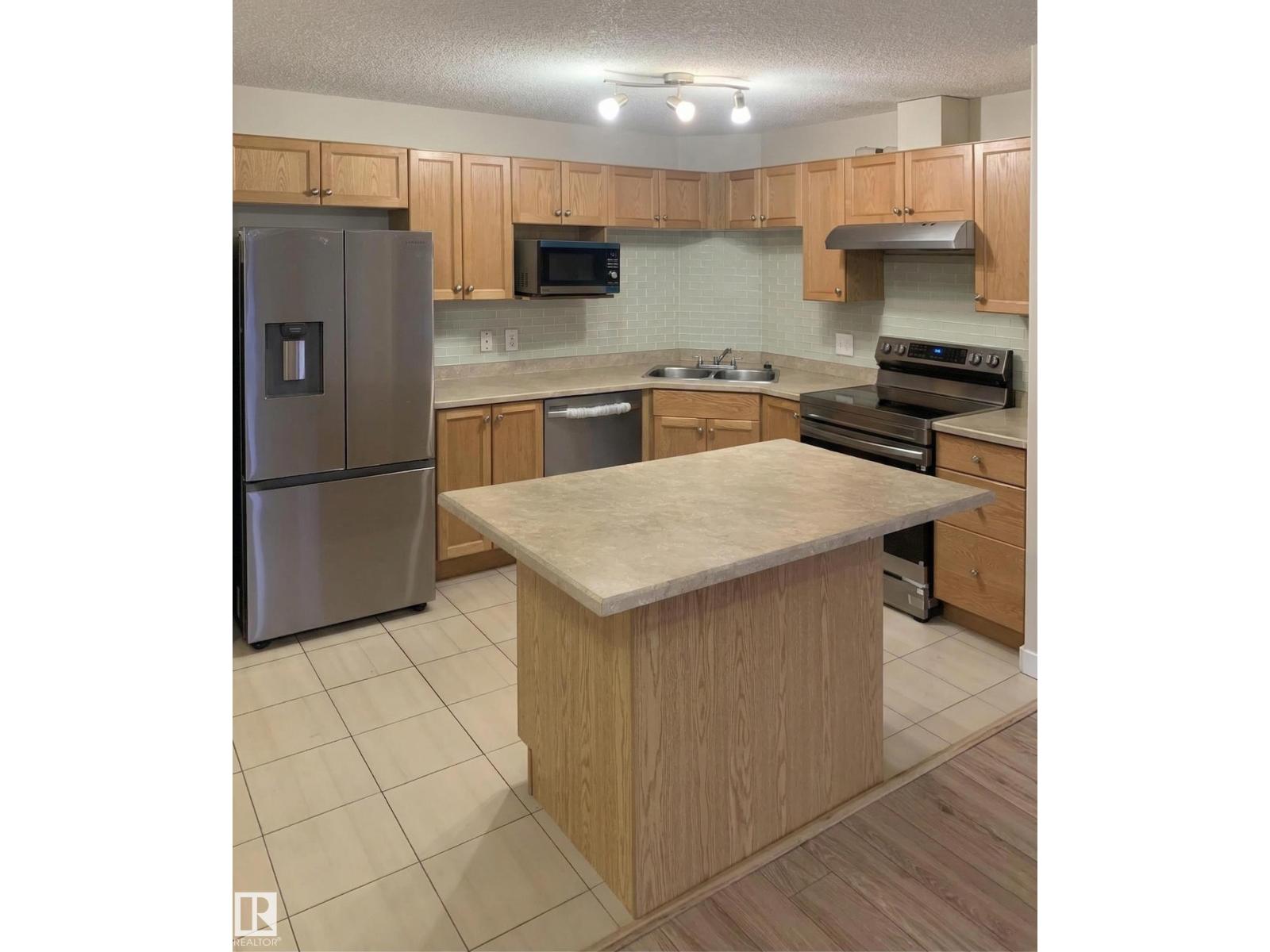 #6211 7331 SOUTH TERWILLEGAR DR NW - 5