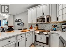 Living room/Fireplace - 34 Boblo Island Boulevard Unit# 103, Amherstburg, ON N9V4C4 Photo 8