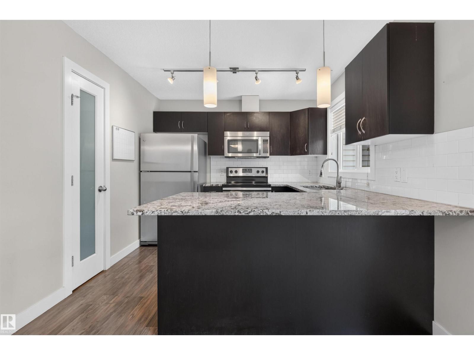 #31 7289 SOUTH TERWILLEGAR DR NW - 6