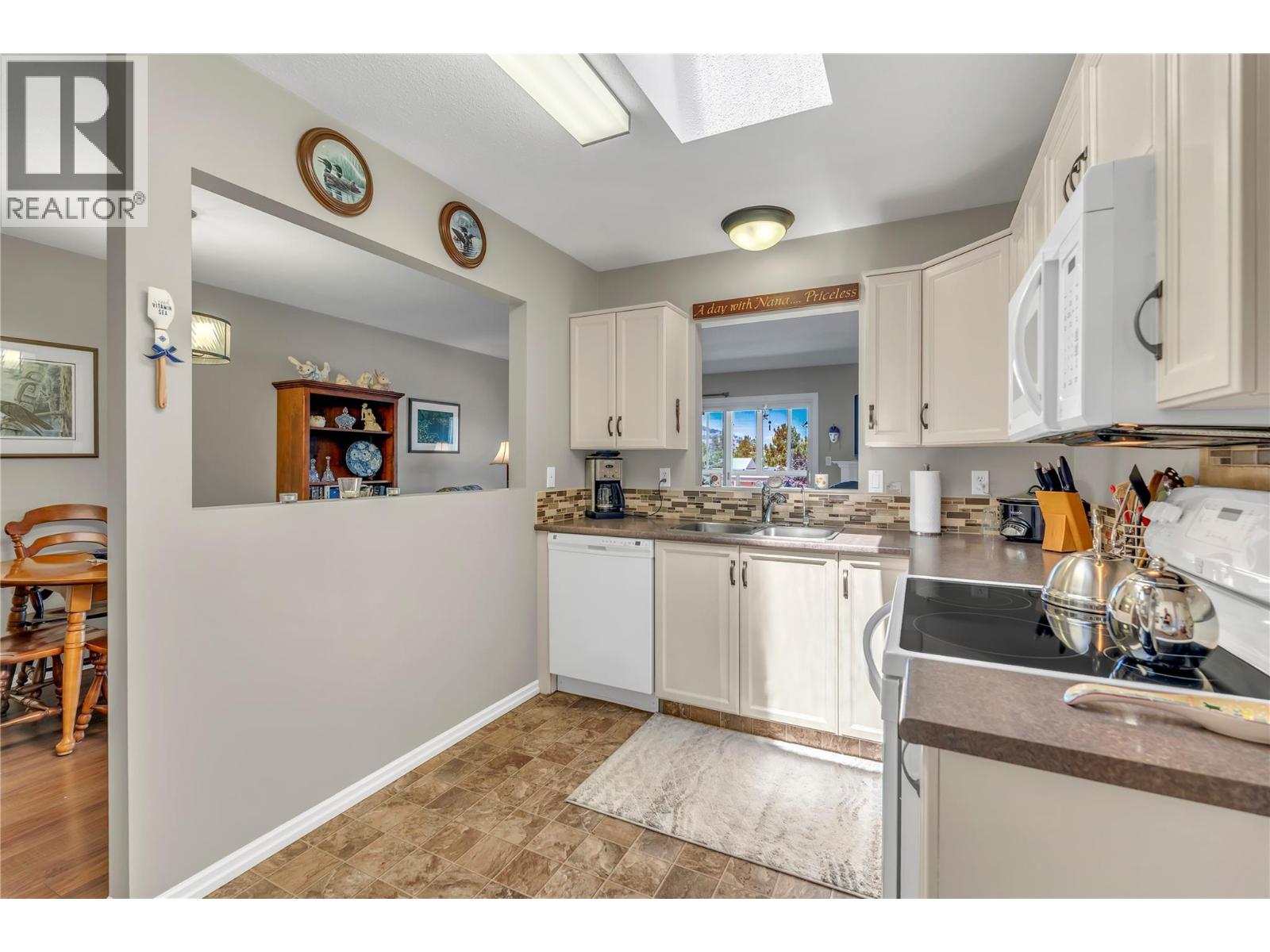 #306 8907 Pineo Court - 9