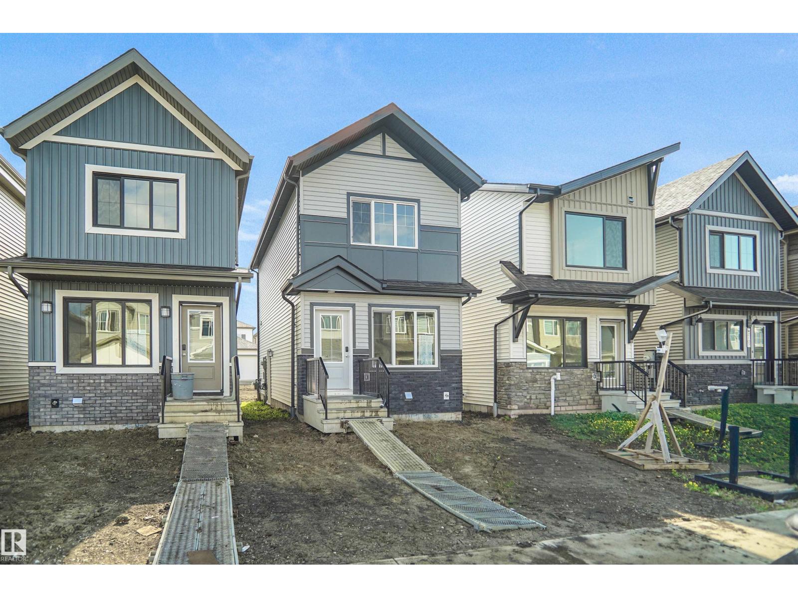 2115 210 ST NW - 2