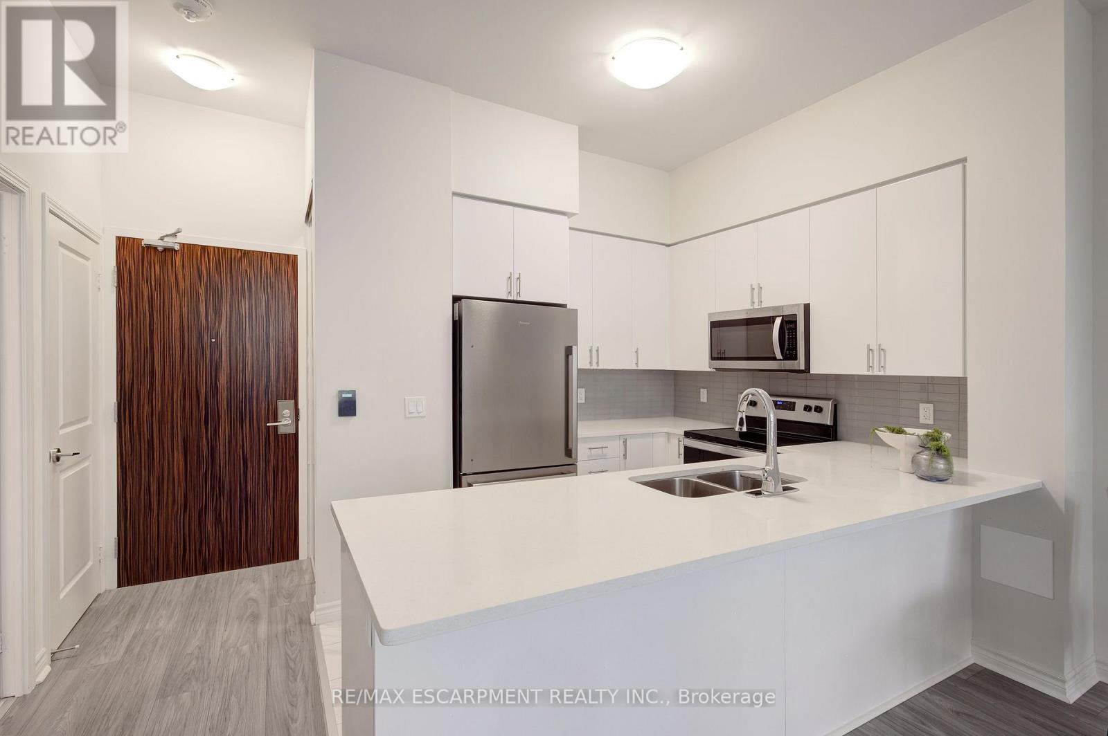 #107 349 RATHBURN ROAD W - Image 3