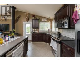 Primary bedroom of 25800 WEST LAKE ROAD · Prince George, BC