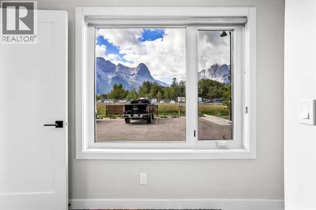 #113 1106 Bow Valley Trail - 33