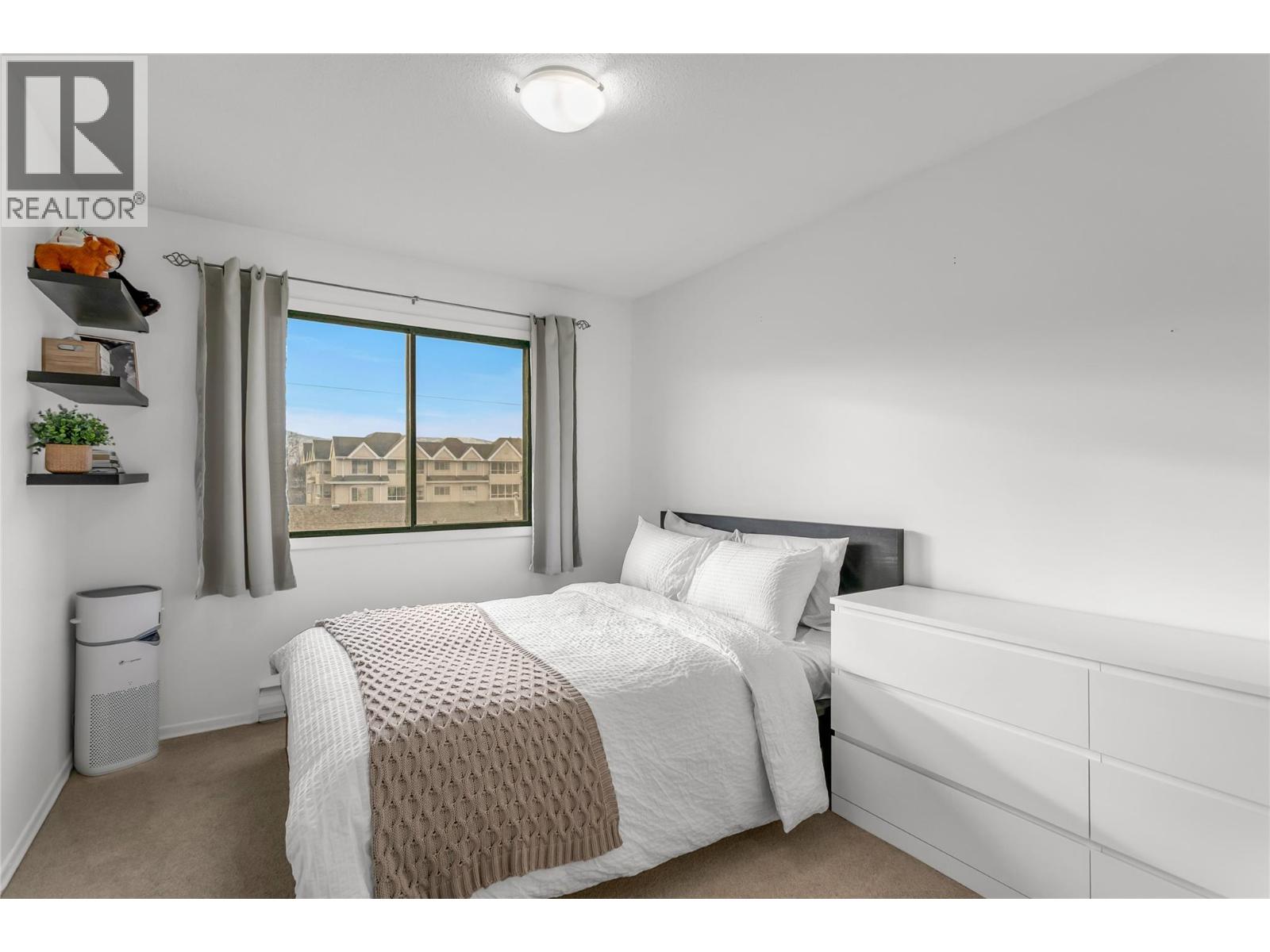 #308 1075 Bernard Avenue - 1