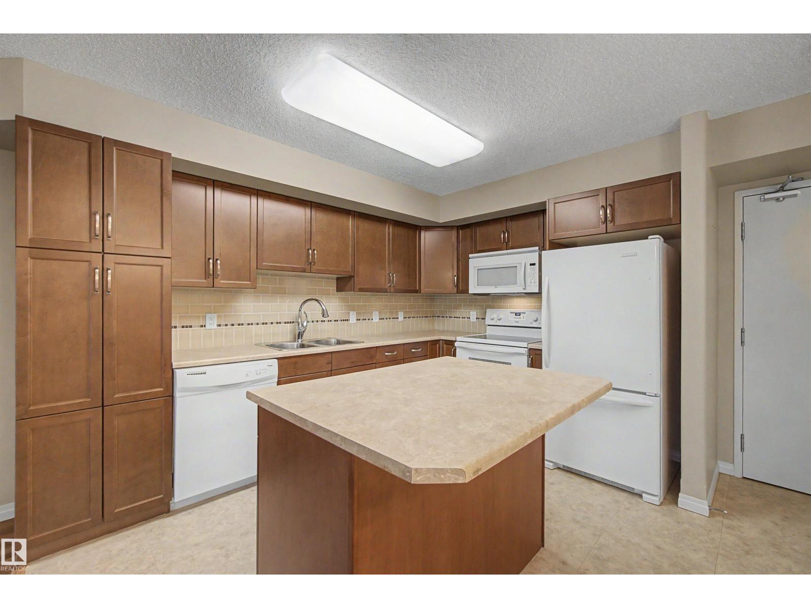 #215 4450 MCCRAE AV NW - 10