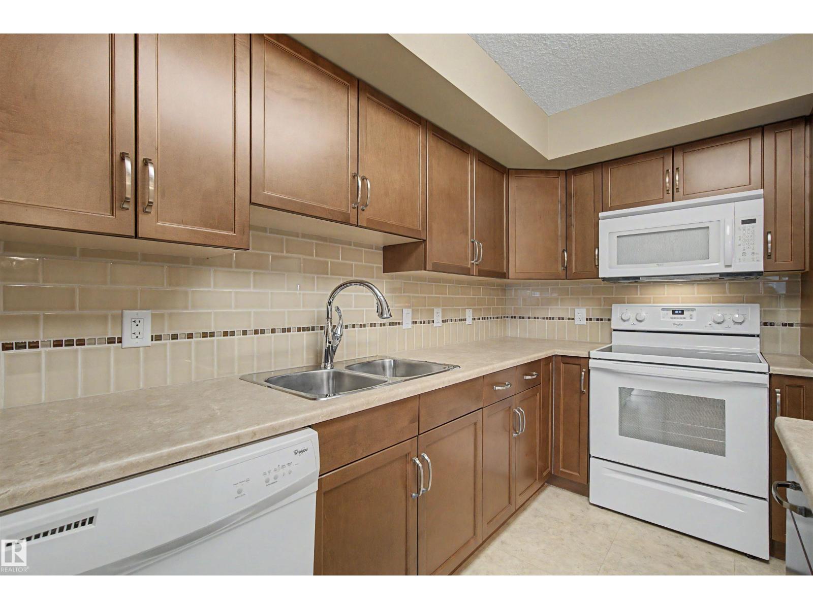 #215 4450 MCCRAE AV NW - 12