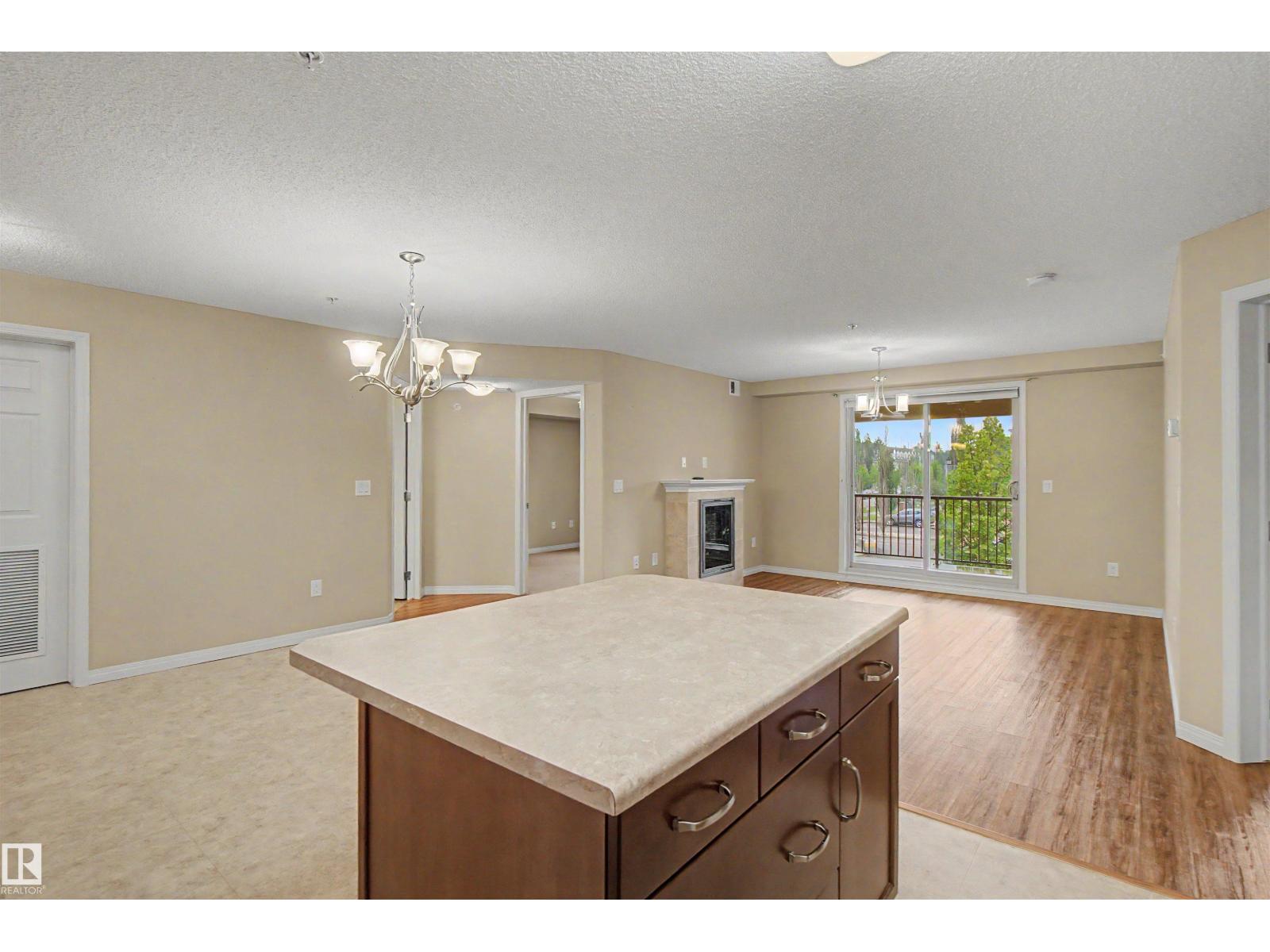 #215 4450 MCCRAE AV NW - 13