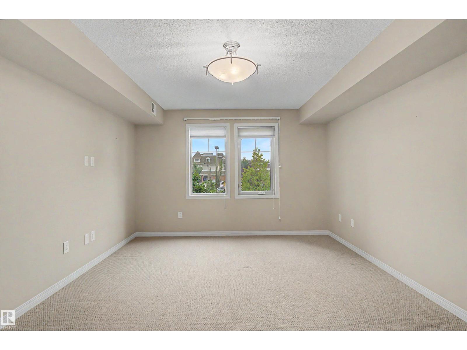 #215 4450 MCCRAE AV NW - 25