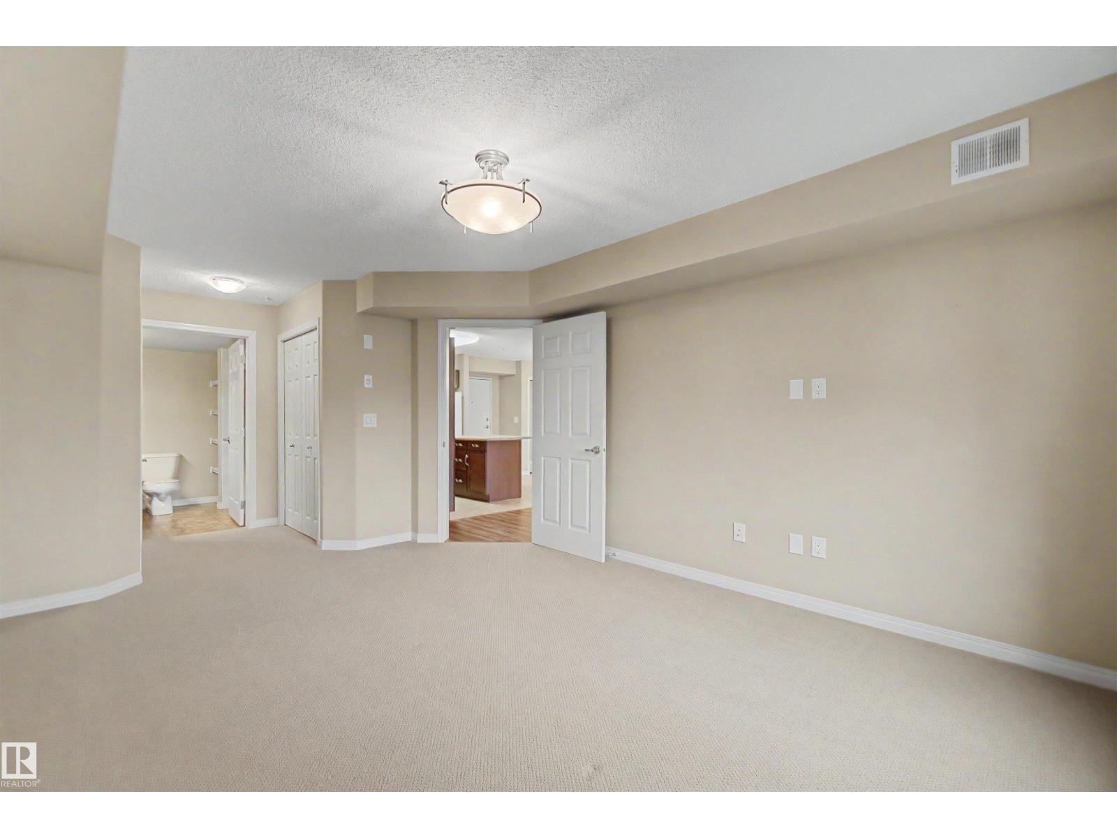 #215 4450 MCCRAE AV NW - 26